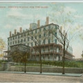 Exterior of Perkins, street view, trees with few leaves.