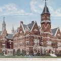 Postcard of a large, institutional building.