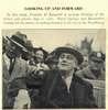 Franklin Roosevelt, with a hat on, looks from a car.