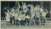 Group photograph of campers waving.  One girl is circled in pen and labelled Me.