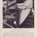 Woman sitting at loom weaving fabric, side view looking left, in light blouse, dark skirt, light apron