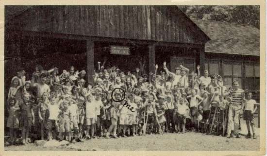Group photograph of campers waving.  One child is circled in pen and labelled "Me."