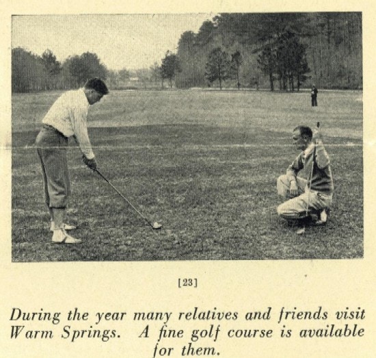 A man is about to hit a golf ball with a driver while another golfer watches.