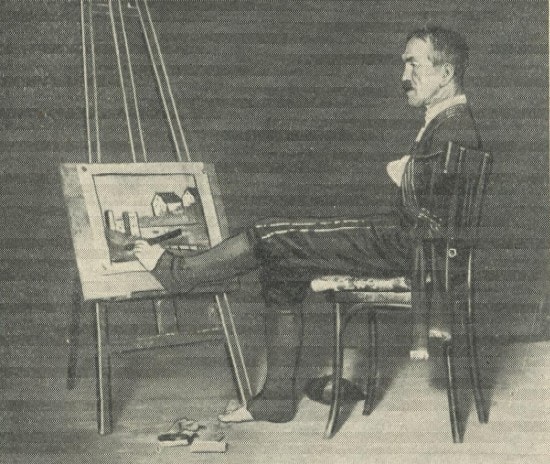 A man paints with his foot.