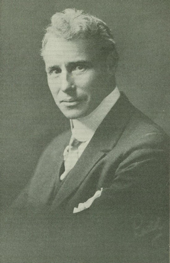 A portrait of Edward R. Johnstone, wearing suit and tie.
